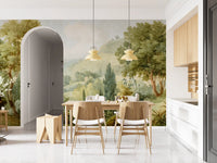 Nature wall mural with rolling slopes, pale sky, and tree-lined depth