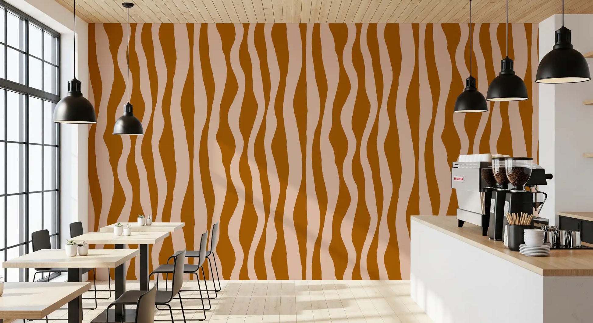Cafe area wall showing Terracotta Stripe Wallpaper with soft pink wave bands