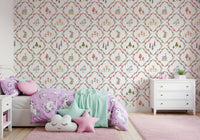 Cottage and heart motif framed by pink blossoms on Woodland Diamond wallpaper