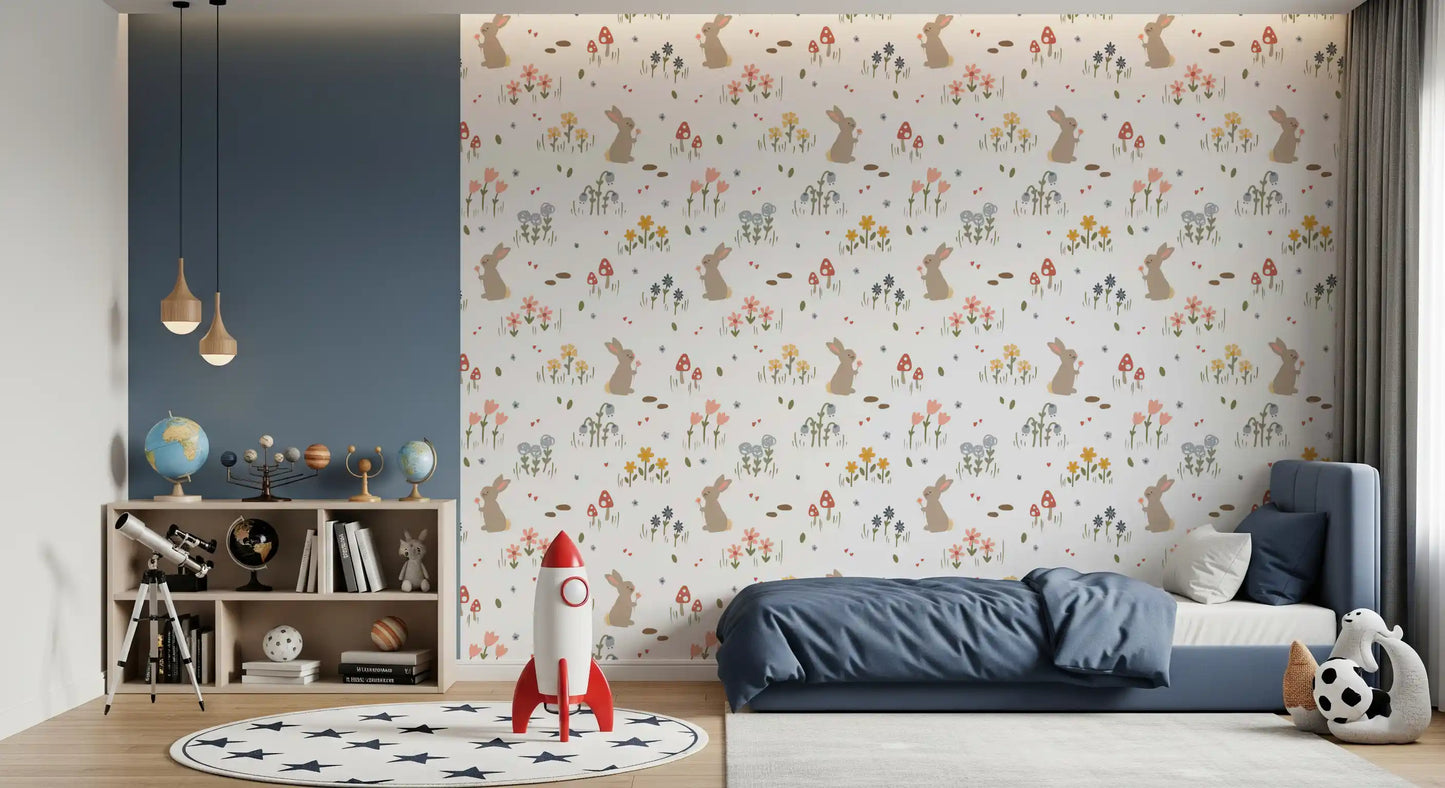 Sweet Meadow Bunnies wallpaper behind a toddler bed in a children's room