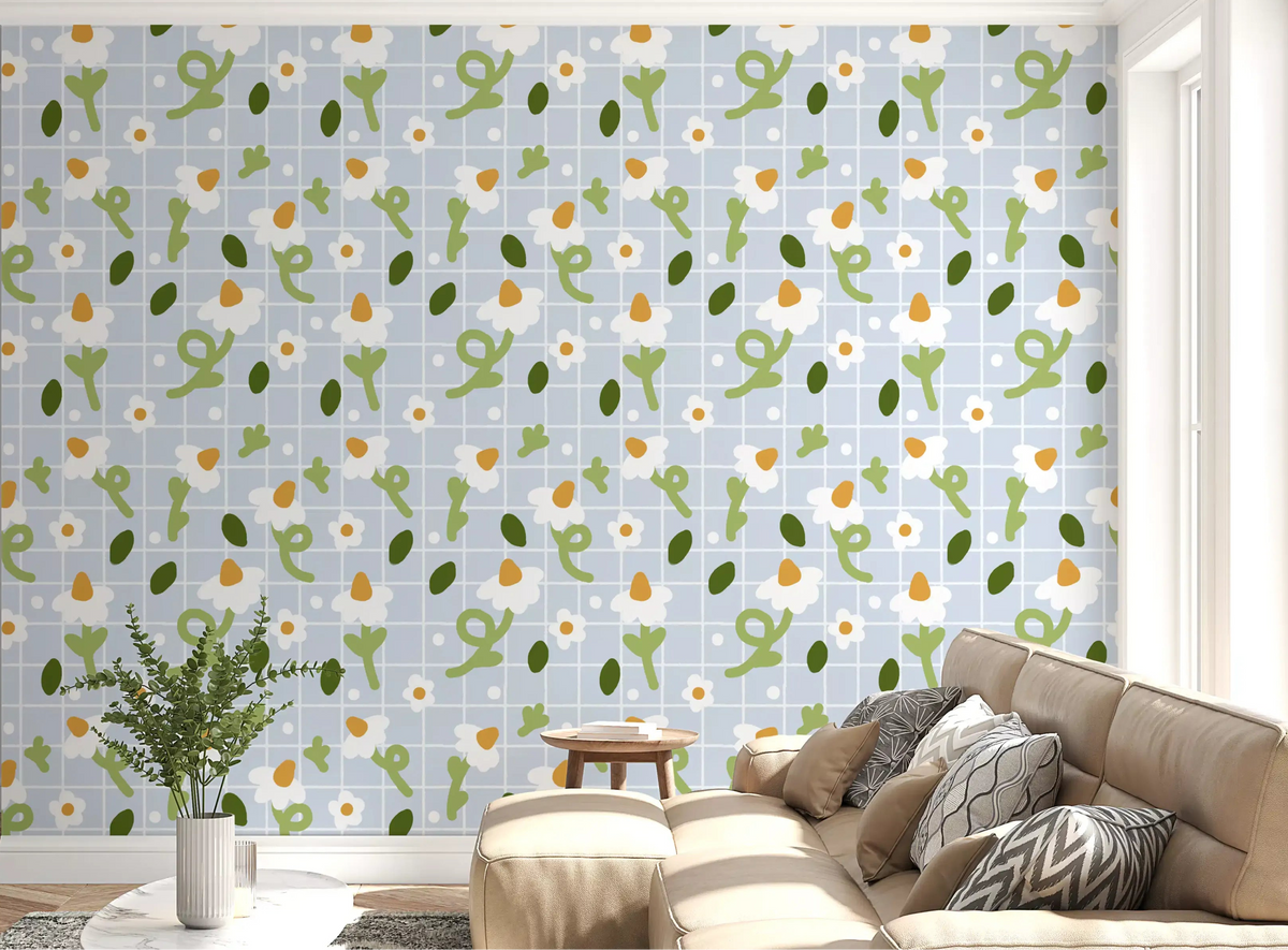 Whimsical Daisies on Blue Grid wallpaper behind a living room seating area