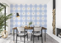 Grey-blue bluebells curving downward on the Floral Gingham wallpaper repeat