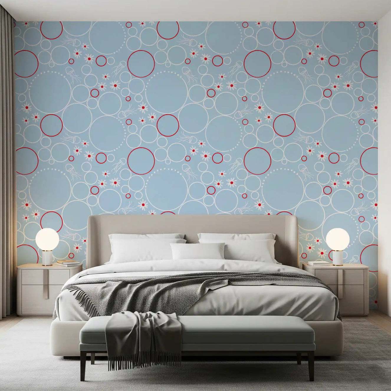 Bedroom with River Bubbles wallpaper behind a low grey bed