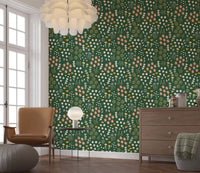 Pattern detail of the Evergreen Floral Wallpaper shows coral, cream and gold tones.