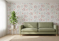 Scandi Branches wallpaper shows scarlet specks clustered on slim ash twigs.