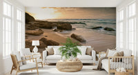 Lounge setting showing coastal sunrise tones of the Golden Quiet Shore wall mural