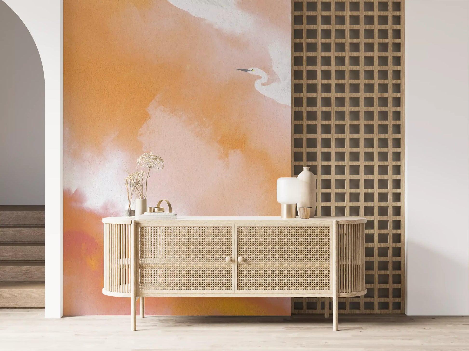 Peach sky heron wall mural brightening a calm living room corner