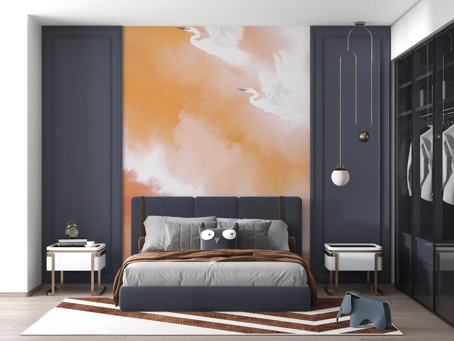 Coral and gold sky framing the Ethereal Flight wall mural herons