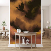 Painterly cloud washes drift through the Flight wall mural in gold and plum
