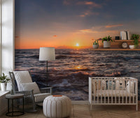 Golden Horizon Waves wall mural with the sun resting low over open swells