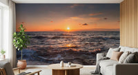 Fiery sundown sky meeting choppy water in this ocean sunset wall mural