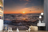 Orange light spilling across the sea on a Golden Horizon wall mural