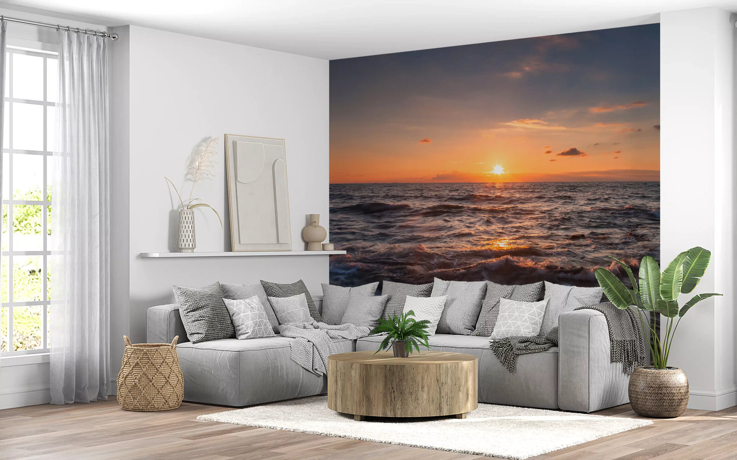 Lounge corner meeting the Golden Horizon sea wall mural and its amber sky