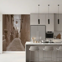 Hanging lamp glows over the Timeless Stone Passage wall mural
