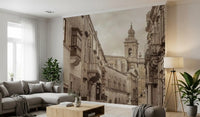 Aged stone facades line the Echoes of Stone and Spire wall mural