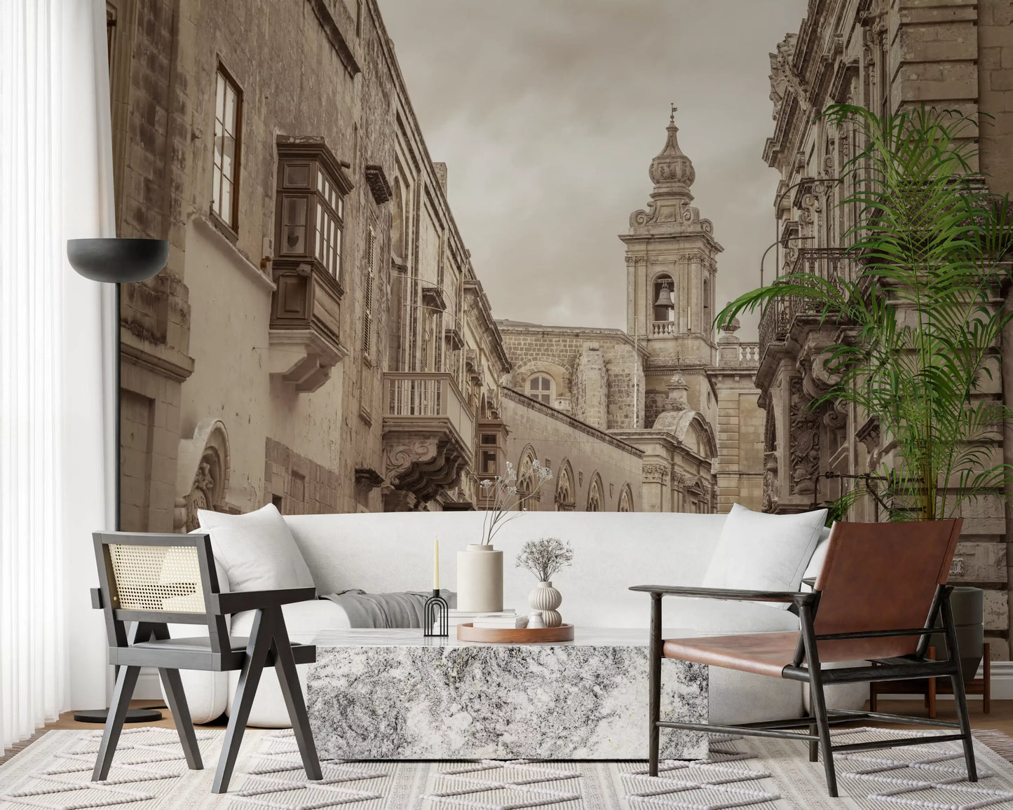 Sepia old-town street recedes toward the spire in this Mdina wall mural