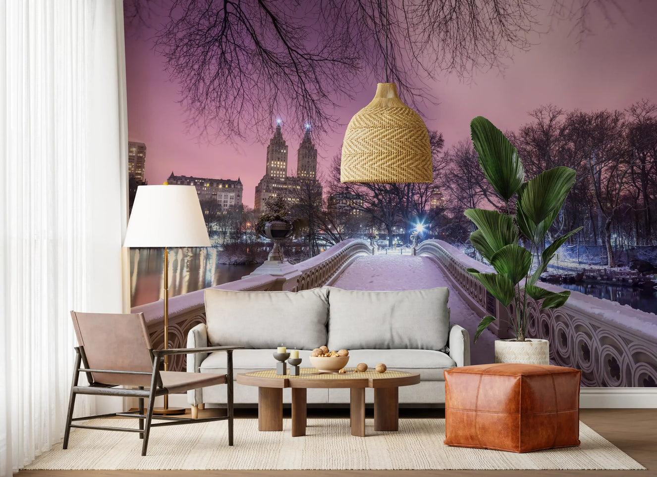 Living room backdrop glowing with the pink Central Park Bow Bridge Winter scene