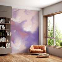 Cranes glide through pink and lavender cloud across the Sky Flight wall mural