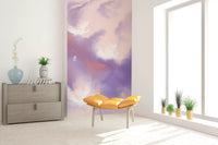 Peach warmth eases the cooler purples of the Ethereal Sky Flight wall mural