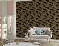 Spotted big cats repeat evenly through this gold and black wallpaper
