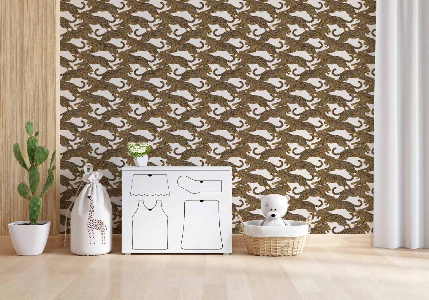 Living room corner backed by repeating golden leopards on this wallpaper