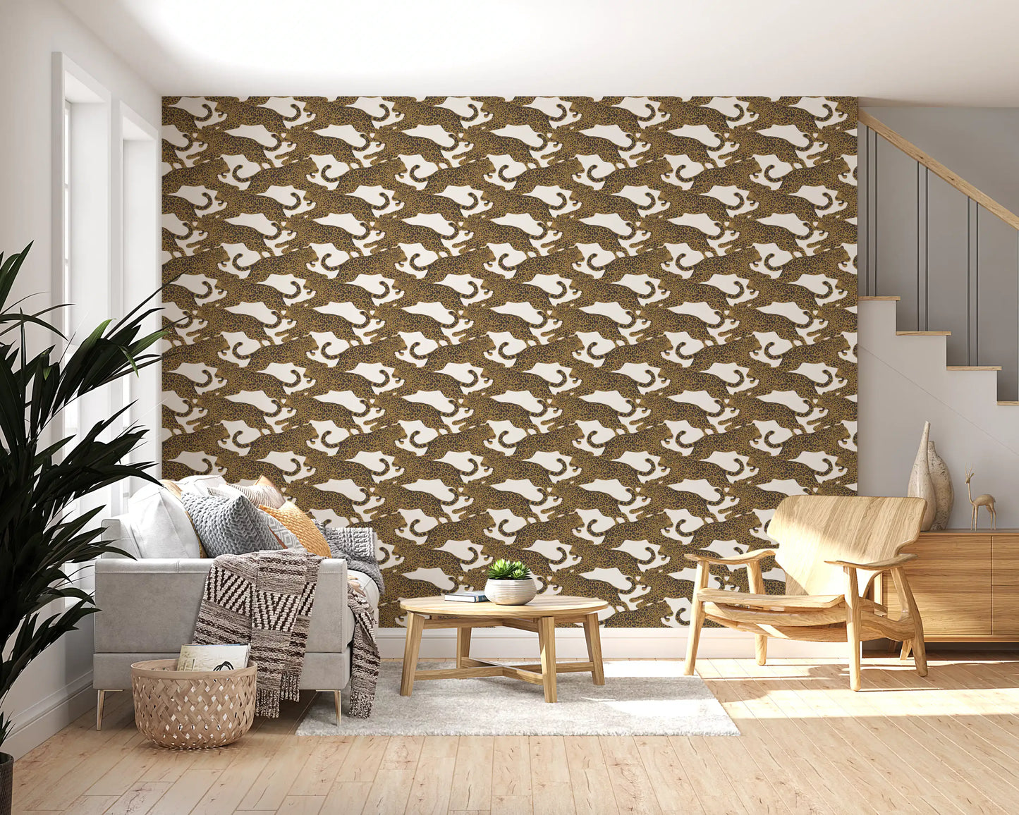 Living area framing the Leopard Chase wallpaper in charcoal-spotted gold