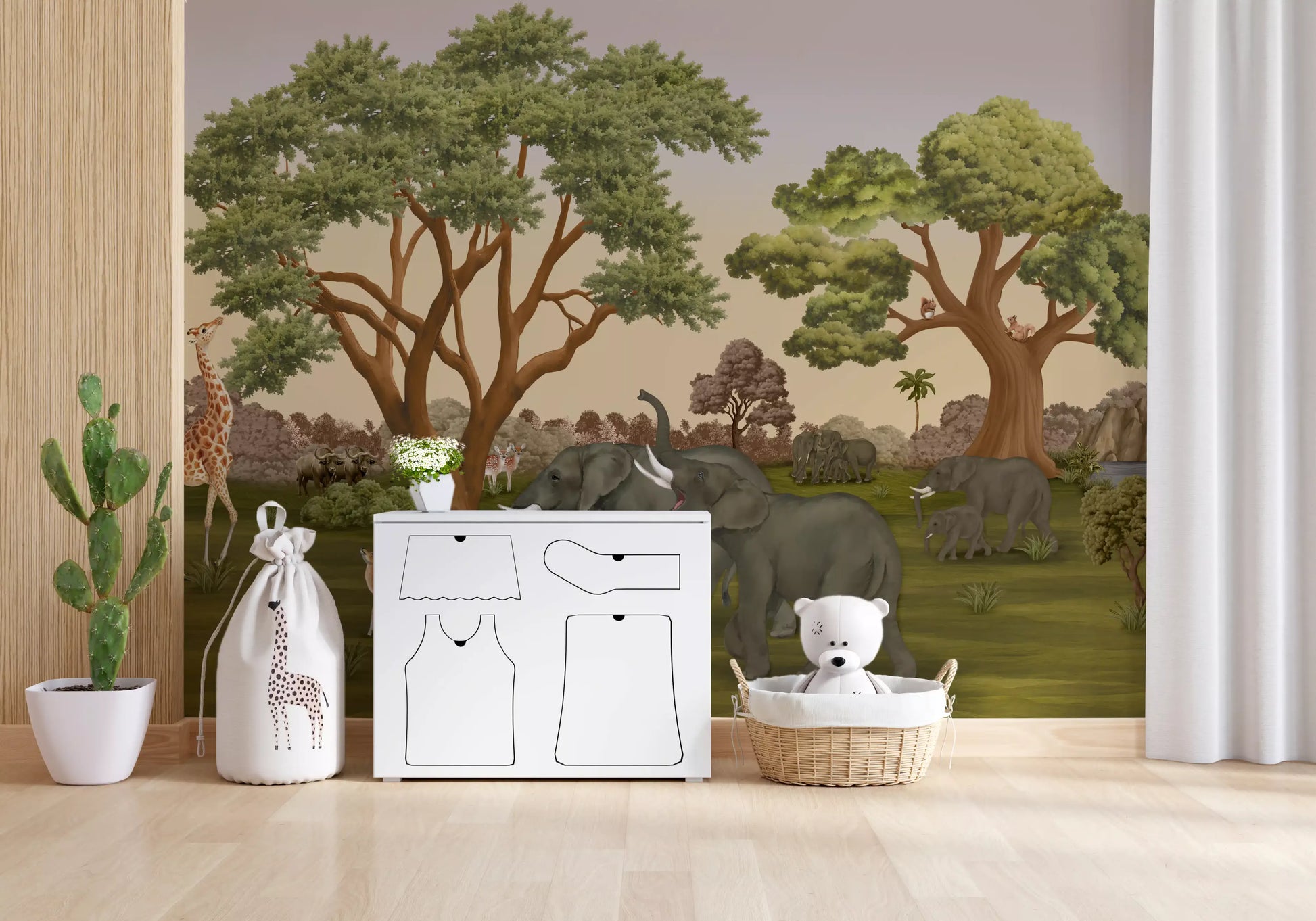 Gentle greens of the savanna wrap a quiet nursery wall mural