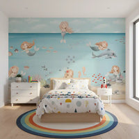 Kids bedroom vanity stands against the calm Mermaid Lagoon Dreams wall mural