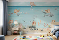 A grey dolphin glides over reeds on this Mermaid Lagoon wall mural
