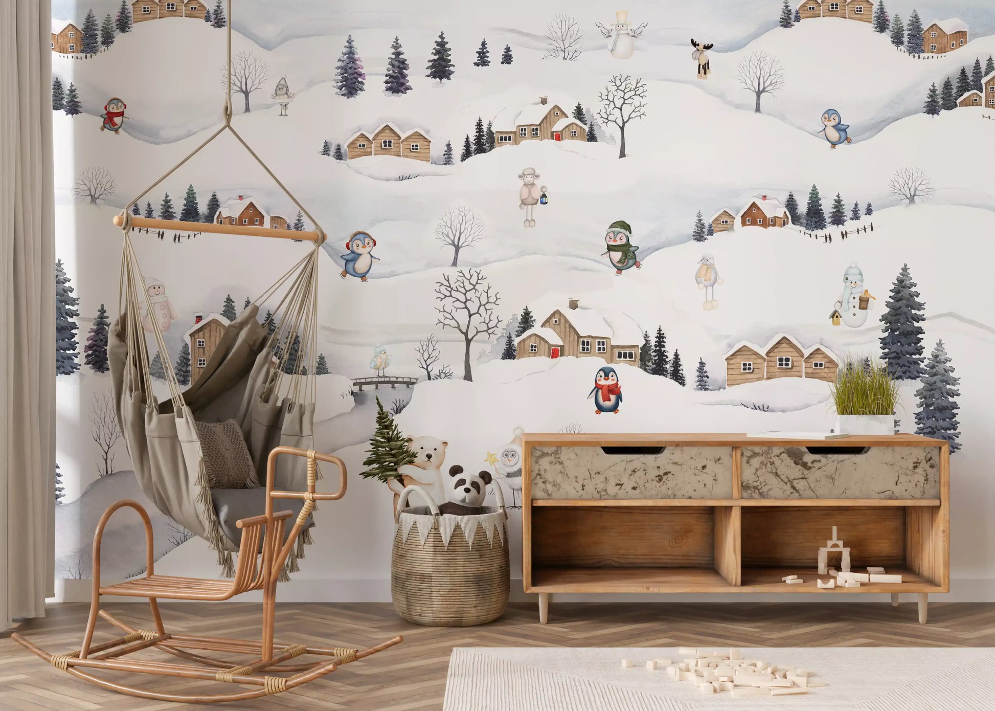 Wooden cabins with red doors dot the Village Playtime wall mural slopes