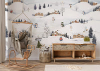 Wooden cabins with red doors dot the Village Playtime wall mural slopes