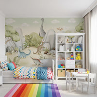 Children's bedroom where painted dinosaurs fill the wall mural