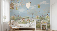 A spotted fawn and squirrel meet near daisies on the Fairy Dreams wall mural