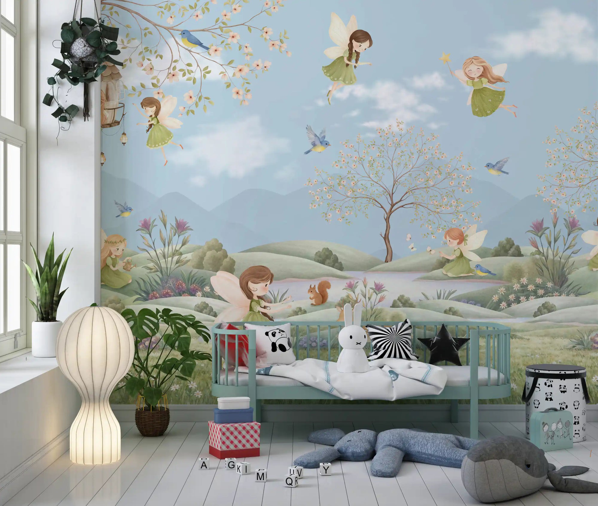 Fairy Dreams wall mural behind a low bed in a soft Nursery play area 