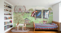 Watercolour carnival wall mural with clown and cycling bear on green field