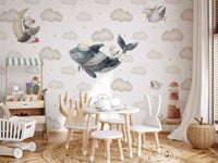 Gold stars scatter between cloud clusters throughout the wall mural