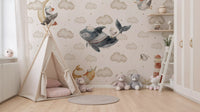 Nursery play area  for little ones backed by the Nautical Cloud Dreams wall mural 