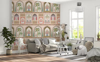 Living room with a blue sofa picks up the coral notes in the Palace wall mural