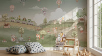 Tiny giraffes and bunnies decorate a play corner backed by the Whimsical Woodland wall mural