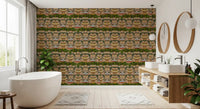 Bathroom where the painted palace wallpaper sits behind a round armchair