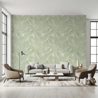 Curved and an arched frame sit before fern wallpaper in a calm living room