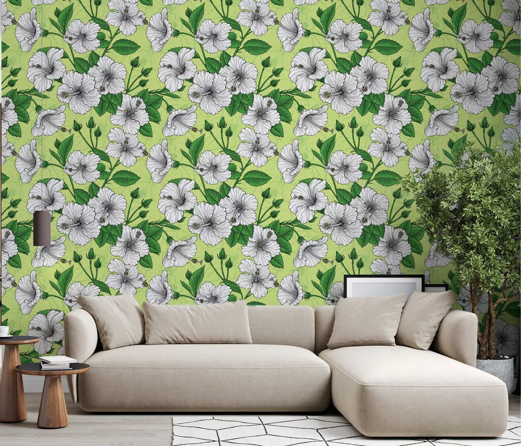 White hibiscus flowers spread across a living room in the Vintage Hibiscus wallpaper.