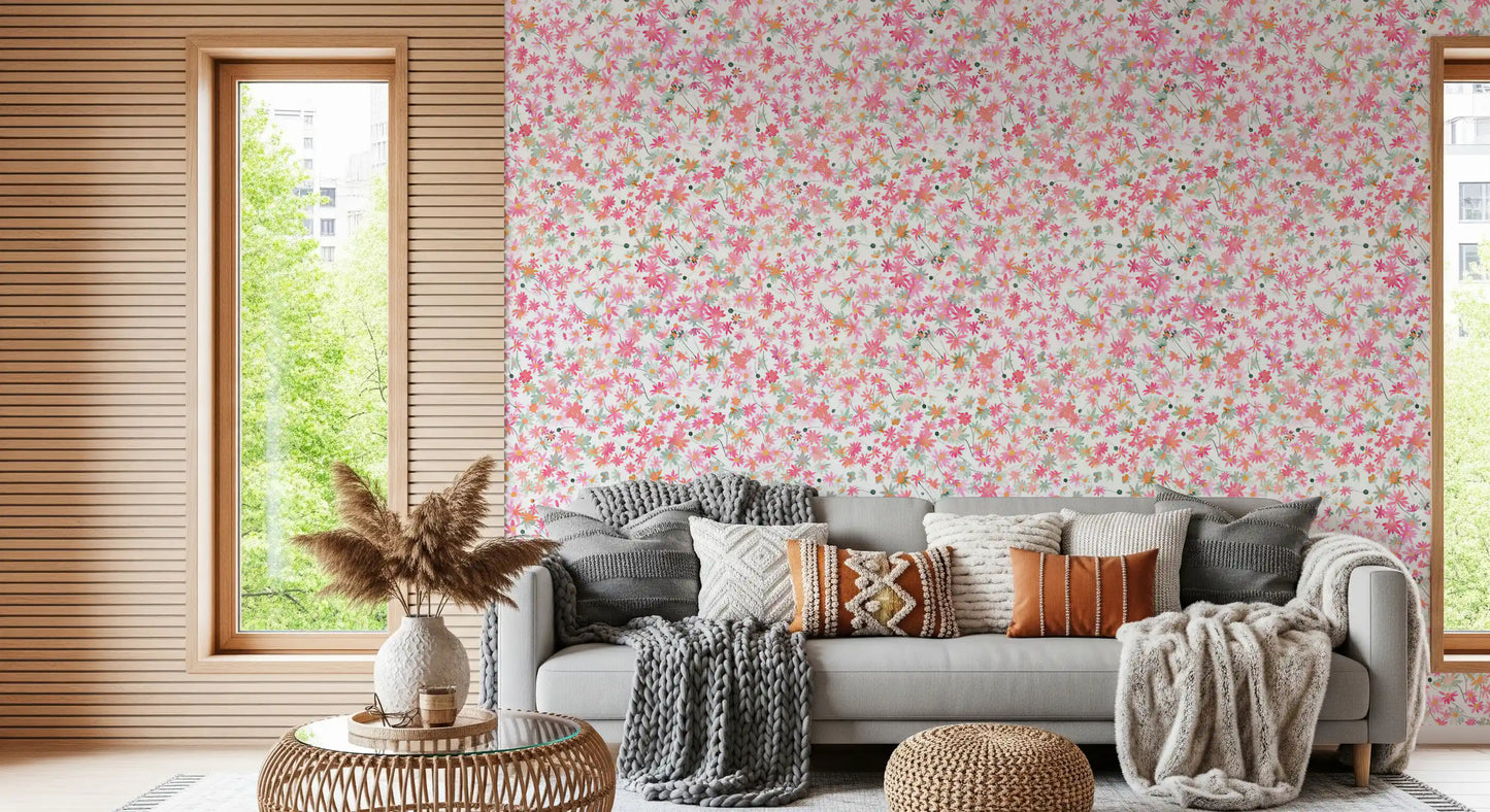 Tiny mint dots peek through Watercolor Dance wallpaper between pink blooms
