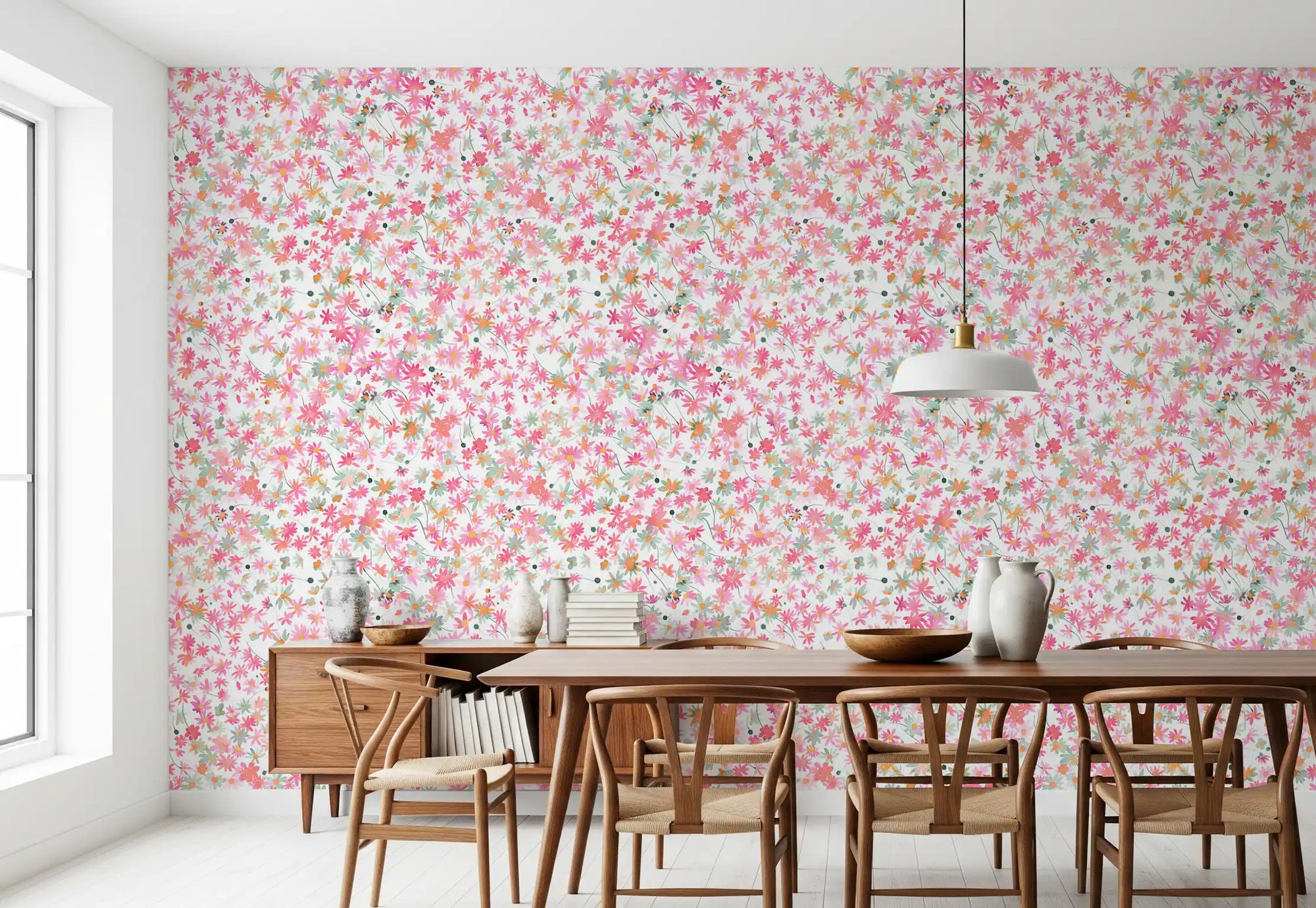 Pink, coral and peach florals cover the dining room in Daisy Dance wallpaper