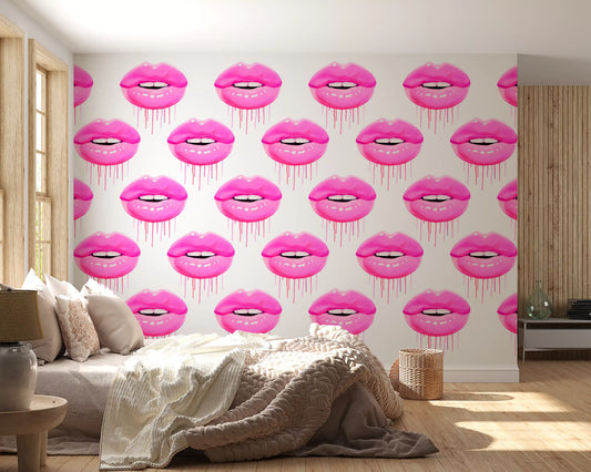 Pink drips trail beneath every lip on the Fuchsia Kiss Pop wall mural inside a bedroom