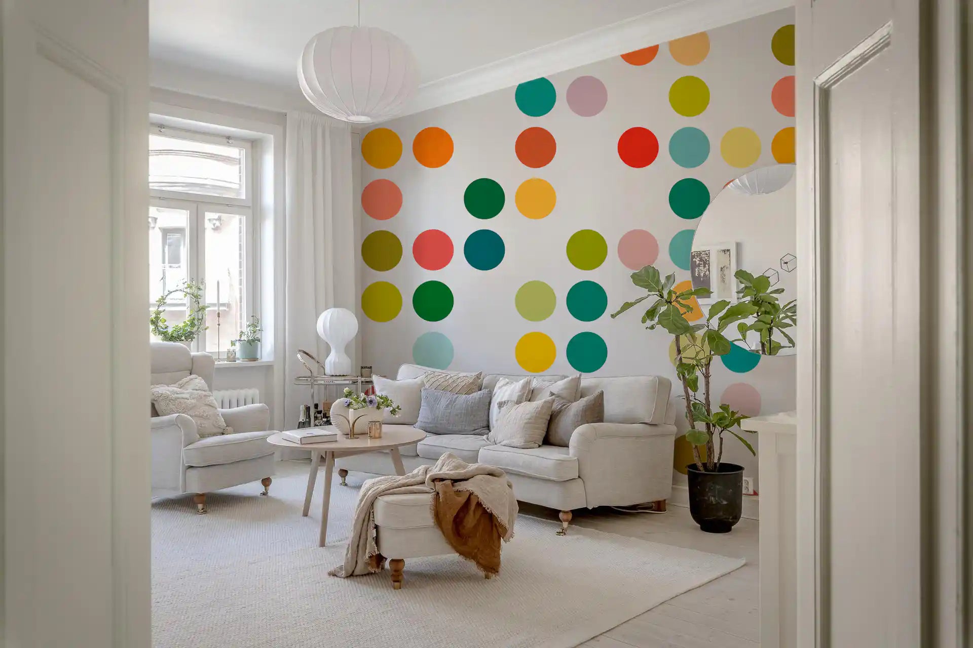 Mid-Century Dot Medley wall mural with bright circles on a pale background