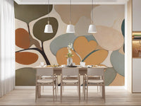 Rust, ochre and teal pebble forms cluster through the Emils Bouquet wall mural