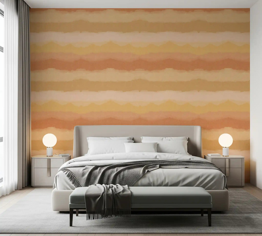 Relax Sunny Painted Horizon Wallpaper warms a bedroom with peach and ochre bands.