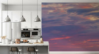 Cloud filled wall mural with pastel dusk colours and depth