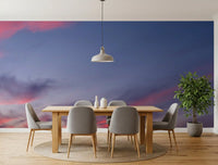 Pastel cloud wall mural with delicate flowers and twilight hues